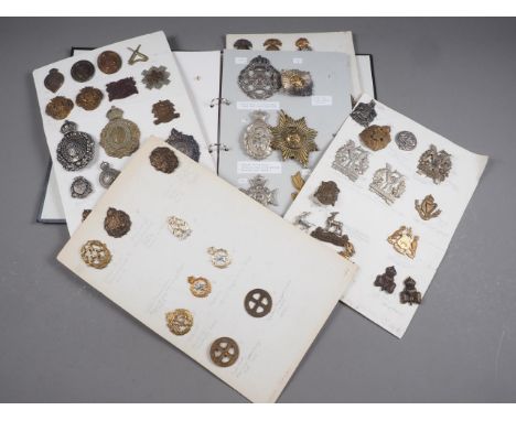 A quantity of mounted military badges, including a Rhine Army Pipers badge, a Special Air Service shoulder belt badge, and va