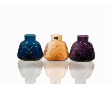 Ronald Stennett Wilson for Kings Lynn (Wedgwood) Glass, a trio of RSW26 'Snowflake' candleholders in Amber, Amethyst and Dark