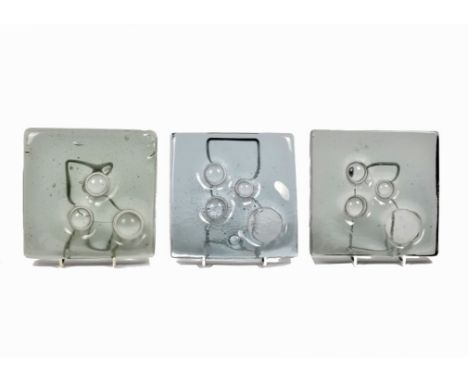 Geoffrey Baxter for Whitefriars, a trio of square Architectural glass slabs, each 17.5 cm, comprising two number 3 in Arctic 