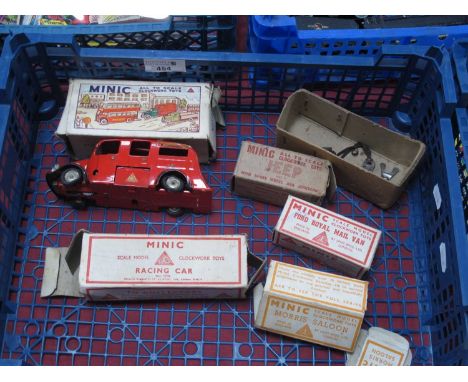 A Quantity of Post Minic Clockwork Vehicles, including a plastic Royal Mail Van, boxed, a Fire Engine, missing parts and a Ra