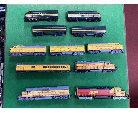 Eleven "HO" Gauge U.S.A Outline Diesel Locomotives - unboxed, comprising, two FT EMD "Rio Grande" A and B units ( four items)