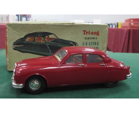 An Original Tri-ang 1:20 Scale 2.4 Litre Jaguar, maroon, electric, body appears unbroken, missing one rear light, boxed, box 