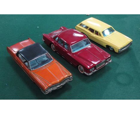 Three Original Tinplate 'Push 'N' Go Cars, by Bandai of Japan, a Chevrolet Estate, a Chrysler Valiant and a Cadillac, all goo