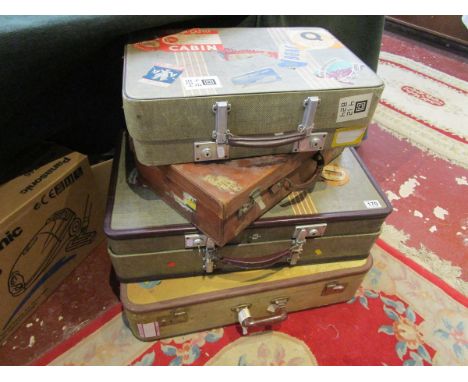 4 vintage suitcases
