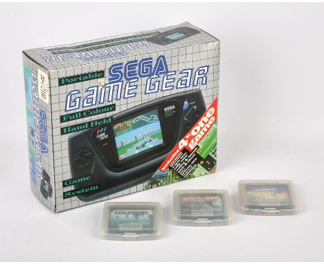 Sega Game Gear - Boxed & 3 Games. This lot contains a boxed Sega Game Gear. The item comes with its original inserts but does