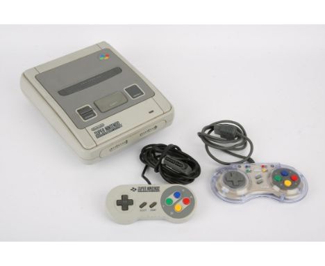 Super Nintendo Entertainment System 'SNES' Console - Unboxed. This lot features an unboxed SNES console, the necessary wires,