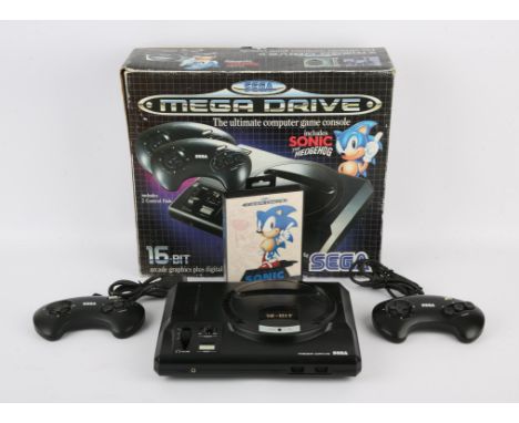 Sega Mega Drive Console - Boxed. This lot contains a Sega Mega Drive (Model 1) boxed in its original packaging and includes a