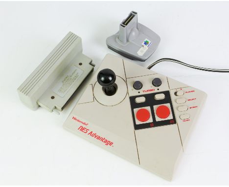 Nintendo Accessory Bundle This lot includes an assortment of Nintendo items such as the NES Advantage Arcade Stick, the N64 P