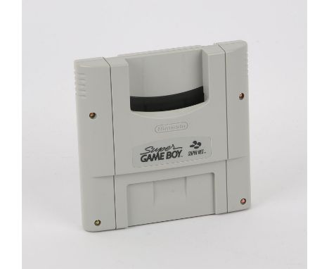 Super Game Boy - SNES Game Boy Converter. Item has never been used and in its original wrapper. This devise allows you to pla