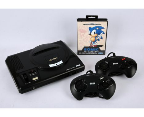 Sega Mega Drive Console. This lot contains a Sega Mega Drive Model 1 console (white label). This item also comes with a boxed