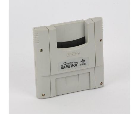 Super Game Boy - SNES Game Boy Converter. This devise allows you to play Game Boy games on you SNES console. 