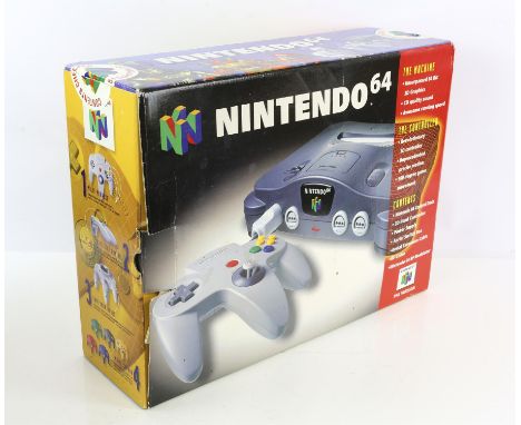 Nintendo 64 - Boxed. This lot contains a boxed PAL Nintendo 64 system, controller and all necessary wires, cables, inserts an