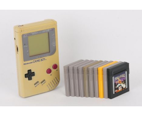 Nintendo Game Boy & 10 Game Collection. This lot features a fully tested original grey Game Boy and 10 games. The handheld is