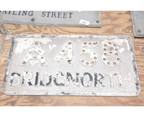 A vintage metal road sign, mid 20th CenturyThe rectangular road sign with raised letter 'A458 Bridgnorth'   46x24cm 