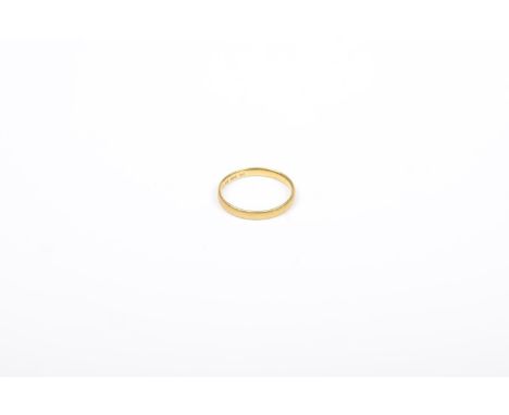 A 22ct gold band ringHallmarks for Sheffield, 1906, ring size K, weight approx. 2.1g. 