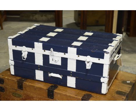 A painted vintage trunkThe slatted trunk with painted metal embellishments and clasp locks, 77cm wide. 