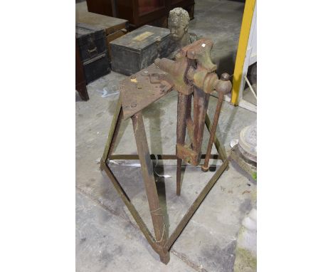 A substantial iron bench vice and stand 