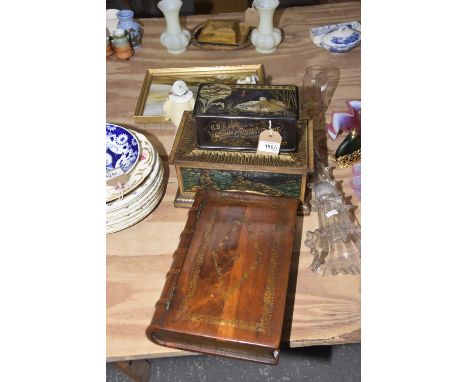 A walnut jewellery box in the form of a bookThe box with gilt detail to front and binding with lettering 'The Quiver 1882' 30