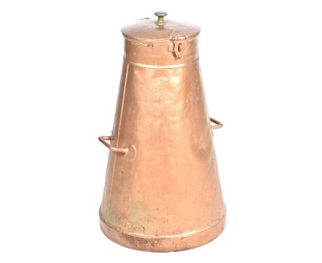 A vintage metal milk churnOf haystack form painted in copper colour with twin handles, brass knob and impressed with makers n