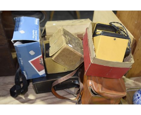 A collection of cameras and camera equipment To include a cased Zeiss Ikon movinette 8, a box camera, a Polaroid camera. (qty
