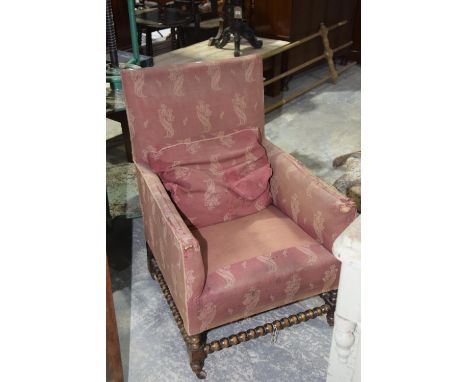 A 17th Century style armchair, late 19th / early 20th CenturyHaving an upholstered rectangular back above upholstered arms an