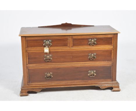 A Victorian mahogany chest of drawersThe rectangular top above two short and two long drawers applied with copper oxidized ri