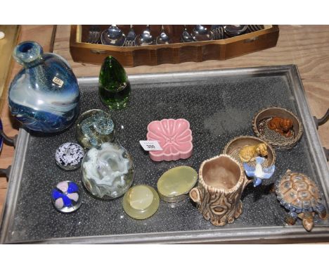 A mixed group of ceramics To include six Wade items including two dogs in baskets, tree trunk with bird, turtle, pink square 