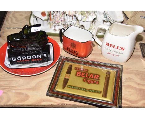 A group of alcohol advertising itemsTo include a Haig Whisky jug, a Bell's Scotch Whisky jub, a Gordon's green glass model of