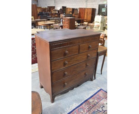 A 19th Century mahogany chest of drawersThe rectangular moulded top above a single secret frieze drawer, two short and three 
