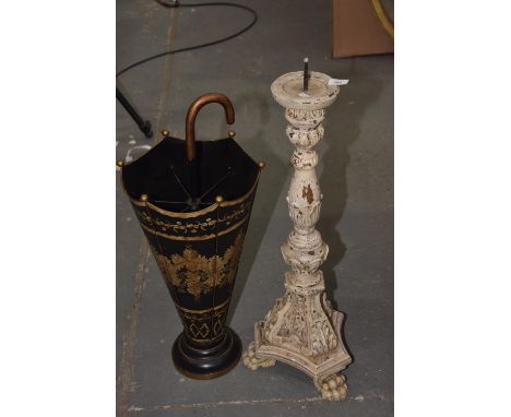 A galvanised painted umbrella standThe stand in the form of a open umbrella with six sections within.   Painted foliate swag 
