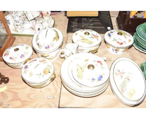 A part Royal Worcester Evesham dinner serviceTo include six dinner plates, four lidded tureens, jug, and two oval dishes all 