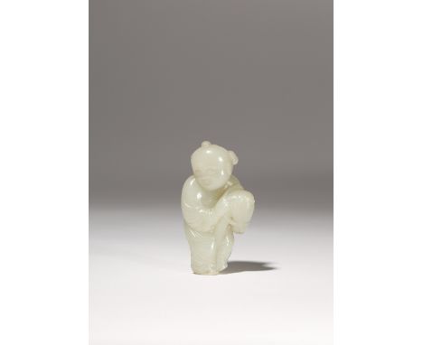 A CHINESE PALE CELADON JADE 'BOY' PENDANT QING DYNASTY OR LATER Carved as a young boy riding a hobby horse, bearing a cheerfu