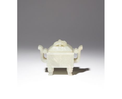 A CHINESE ARCHAISTIC PALE CELADON JADE INCENSE BURNER AND COVER, DING QING DYNASTY The rectangular-section body carved to the