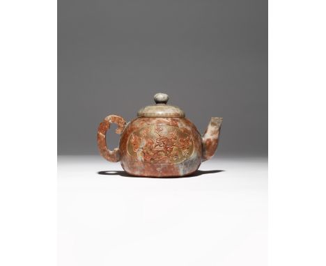 A CHINESE SOAPSTONE TEAPOT AND COVER QING DYNASTY Decorated in low relief with two cartouches enclosing sprays of peony and p