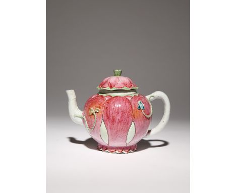 A CHINESE FAMILLE ROSE MOULDED 'LOTUS' TEAPOT AND COVER 18TH CENTURY The body brightly painted with large lotus petals, decor