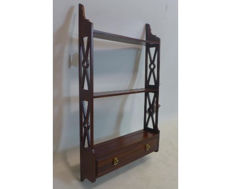 A Regency style mahogany wall shelf with drawer, H.70 W.40 D.10cm 