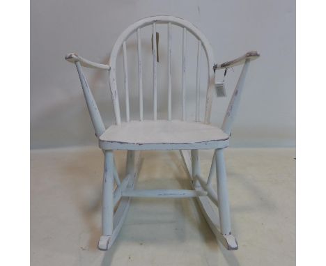 A 20th century white painted Ercol child's rocking chair 