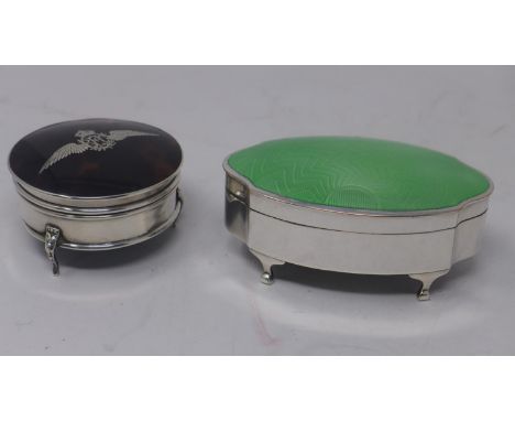 An early 20th century silver and tortoisehell casket, with Royal Flying Corps insignia to tortoiseshell top, on three cabriol