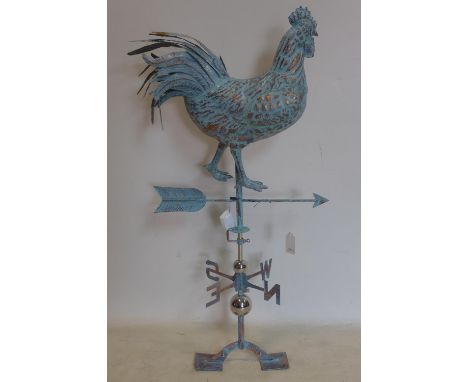A sheet metal cockerel weather vane, in the verdigris finish, H.93cm 