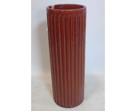 A Burmantofts Pottery Faience stick stand, of fluted design, marked to base, H.64cm, with some small chips and cracks 