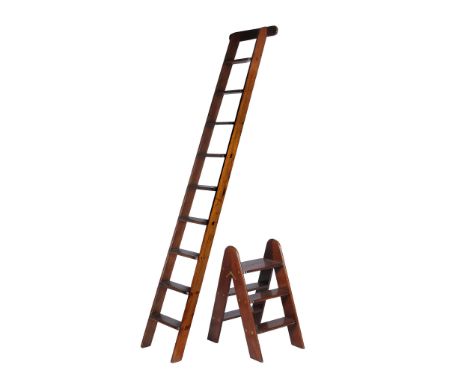  A mahogany library ladder, late 19th/early 20th century  , surmounted by a bar rest, appox. 240cm high,   together with a sm