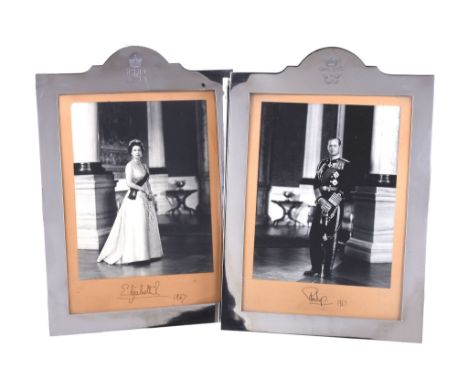  [Elizabeth II and Prince Philip] A pair of signed photographs in silver frames by Henry Hodson Plante,   London 1966, each b