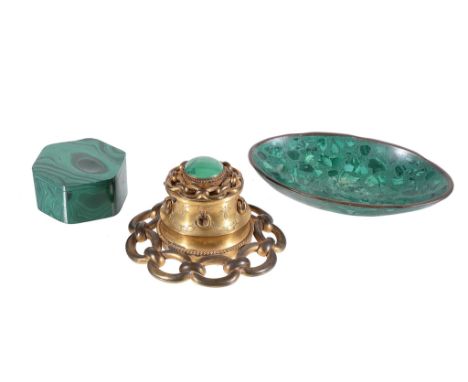  A Victorian gilt brass and malachite mounted inkwell,   circa 1870, of capstan form, the hinged cover with inset cabochon an