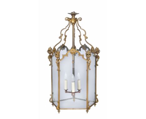  A gilt metal and glazed hall lantern in 18th century taste,   second half 20th century, of pentagonal section, the arch topp