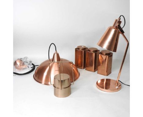 A modern copper coloured ceiling light, 38cm diameter, together with a matching desk lamp and a set of three canisters