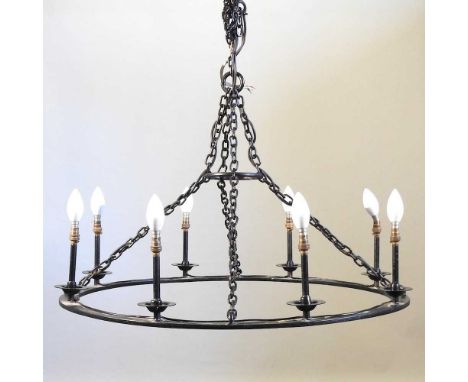 A large blacksmith made iron circular ceiling light