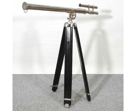 A modern telescope, 96cm, on an adjustable standThis is modern and in working condition. Not high quality and has light signs