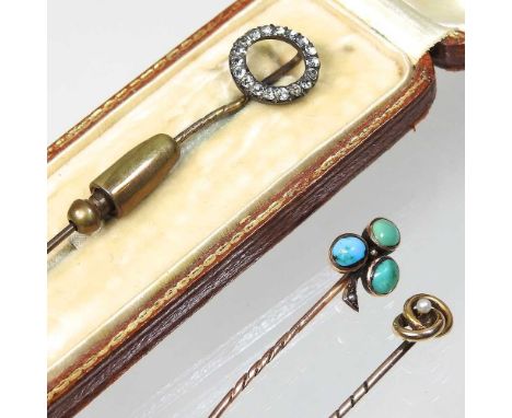 A 19th century silver and gem set hoop stick pin, 7cm high, together with a 15 carat gold and seed pearl pin and another of s