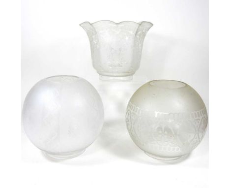 An etched glass oil lamp shade, of flared shape, with a 10cm aperture, together with two others (3)
