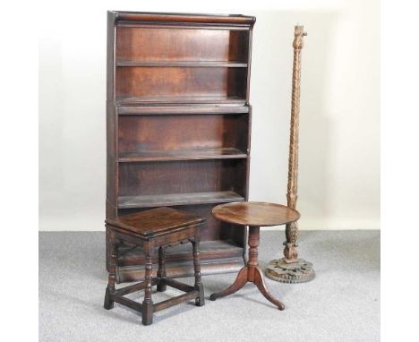 An early 20th century oak sectional bookcase, 87w x 163cm, together with an ornate gilt standard lamp, a folding oak joint st